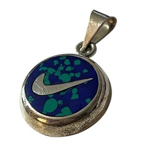 1990s to 2000s sterling silver and blue/green azurite Nike symbol pendant